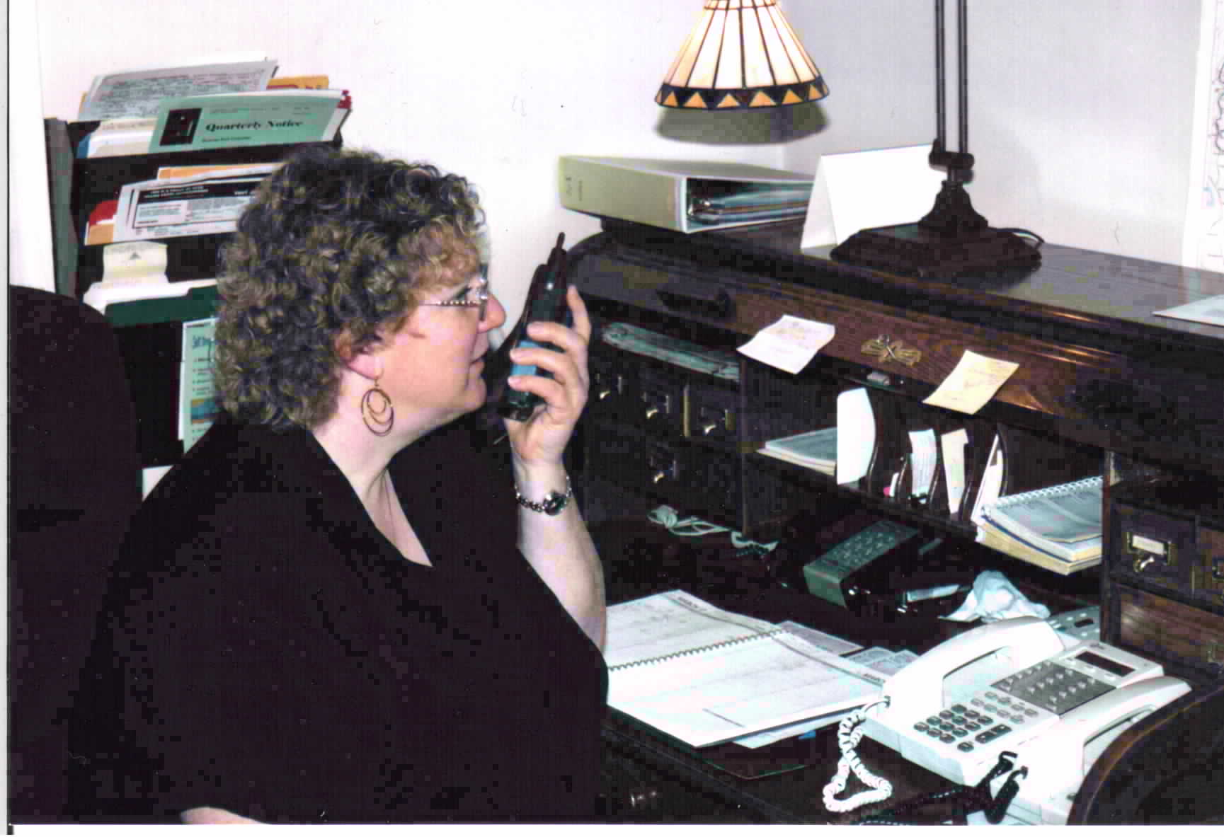 Cyndy at the desk
